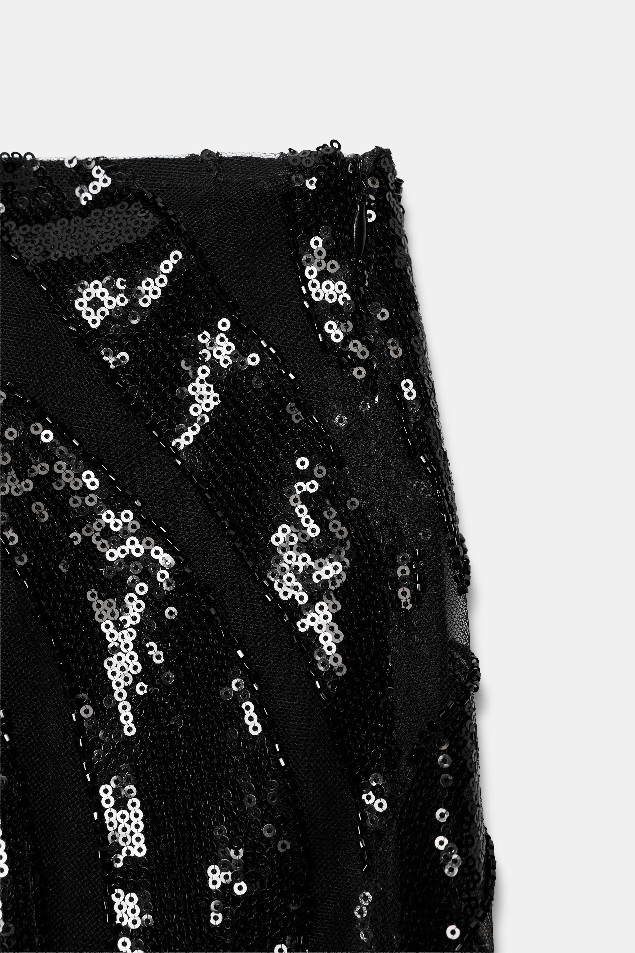 JUPE À FRANGES ET PAILLETTES